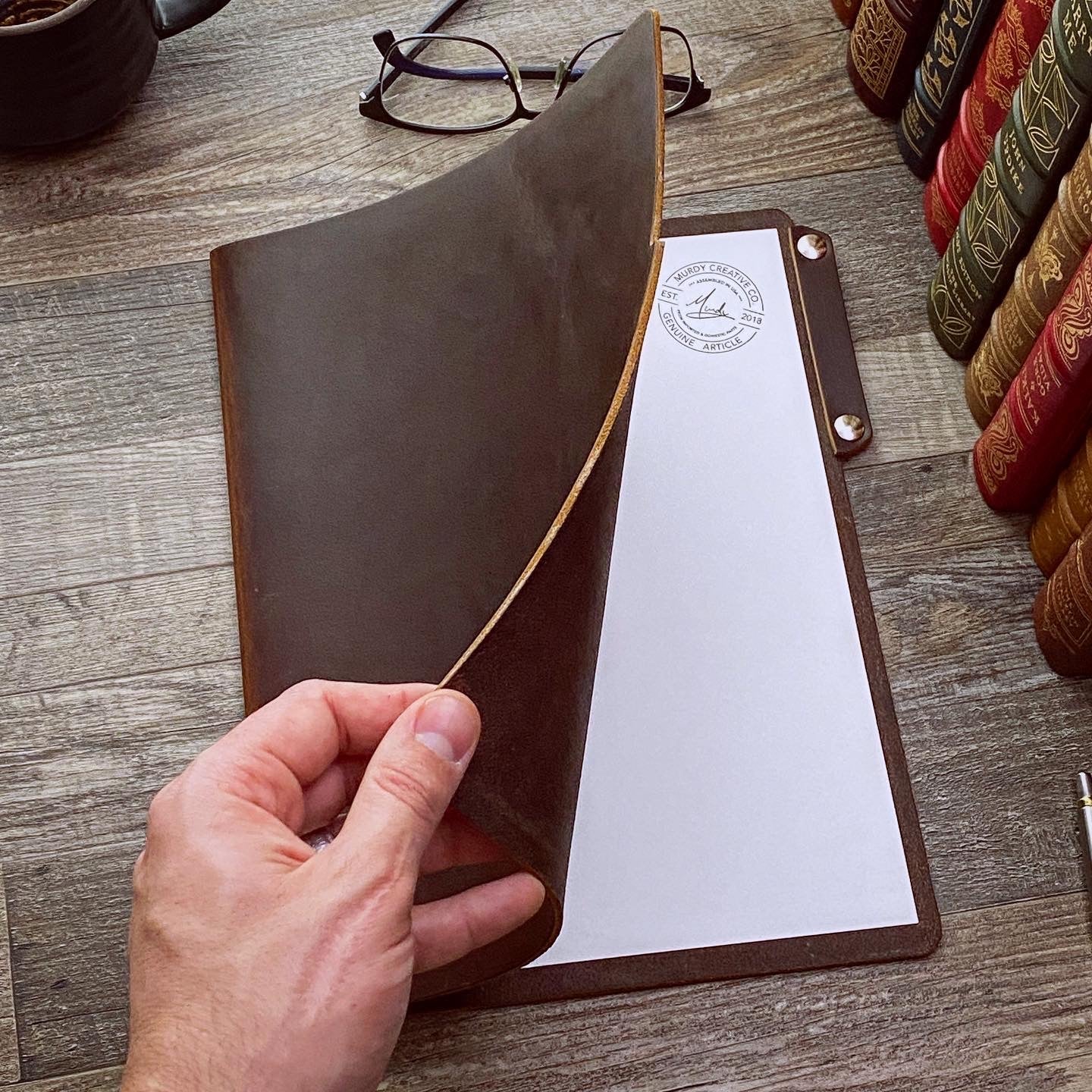 Mini Cut Refillable Leather Journal in Brown Americano Leather on Desk