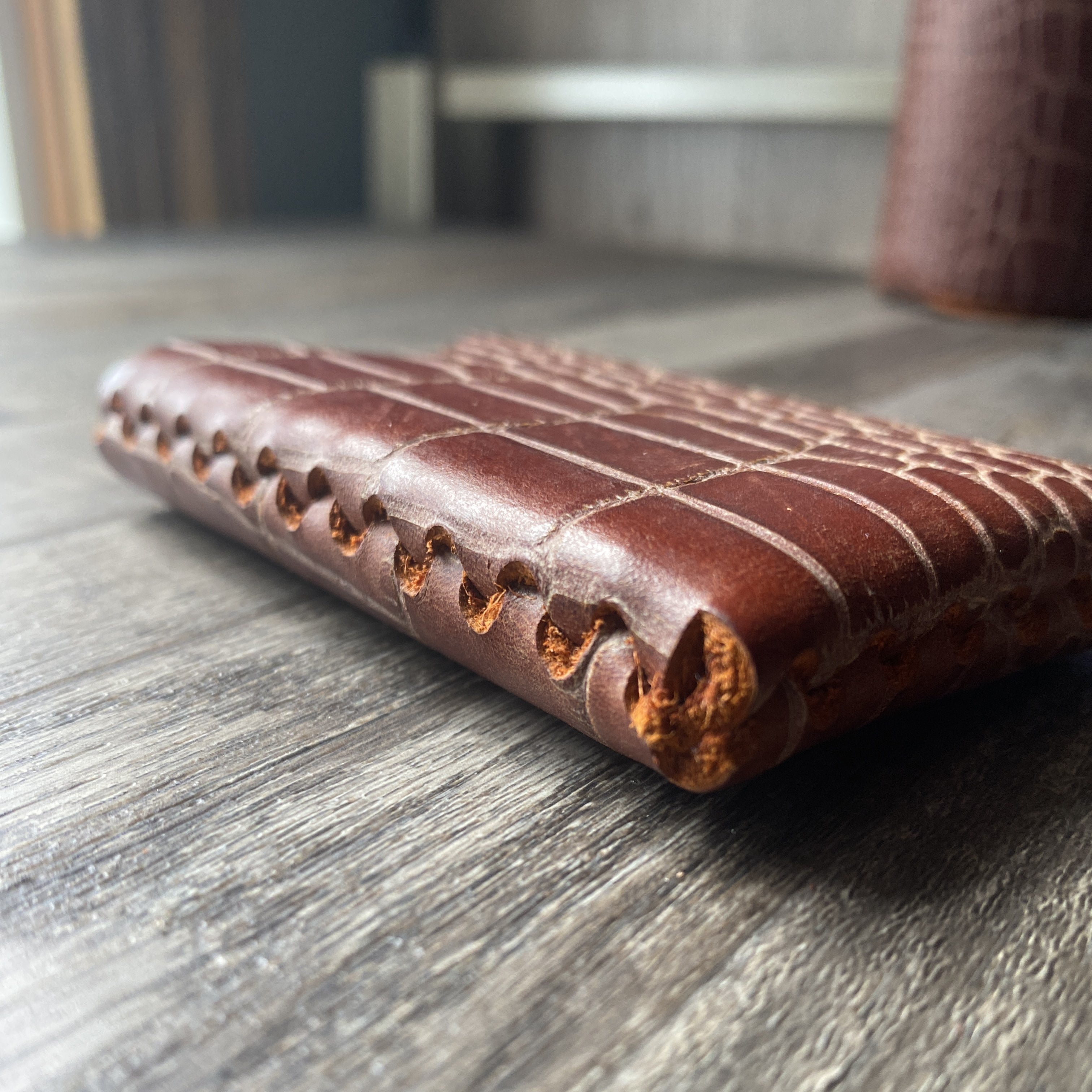 Crocodile embossed hot sale leather wallet